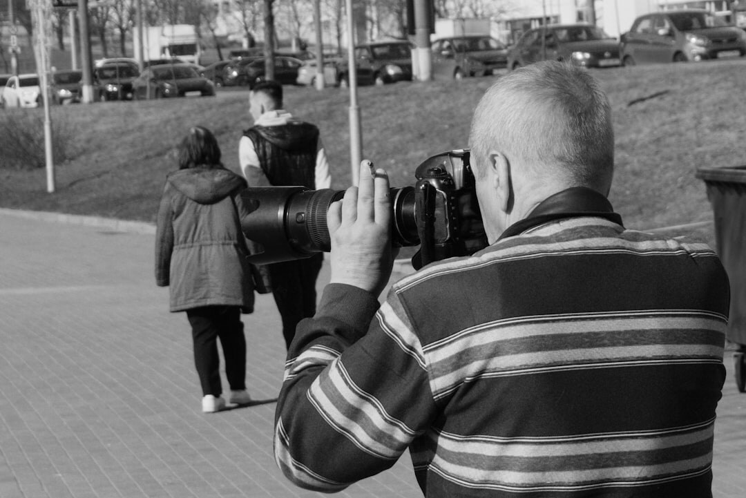 documentary photographer capturing street scenes