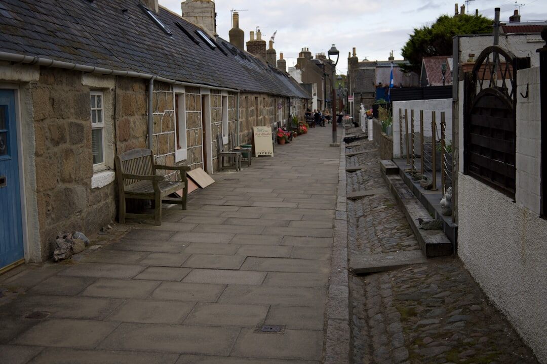 Narrow street in a small Danish coastal village with colorful houses