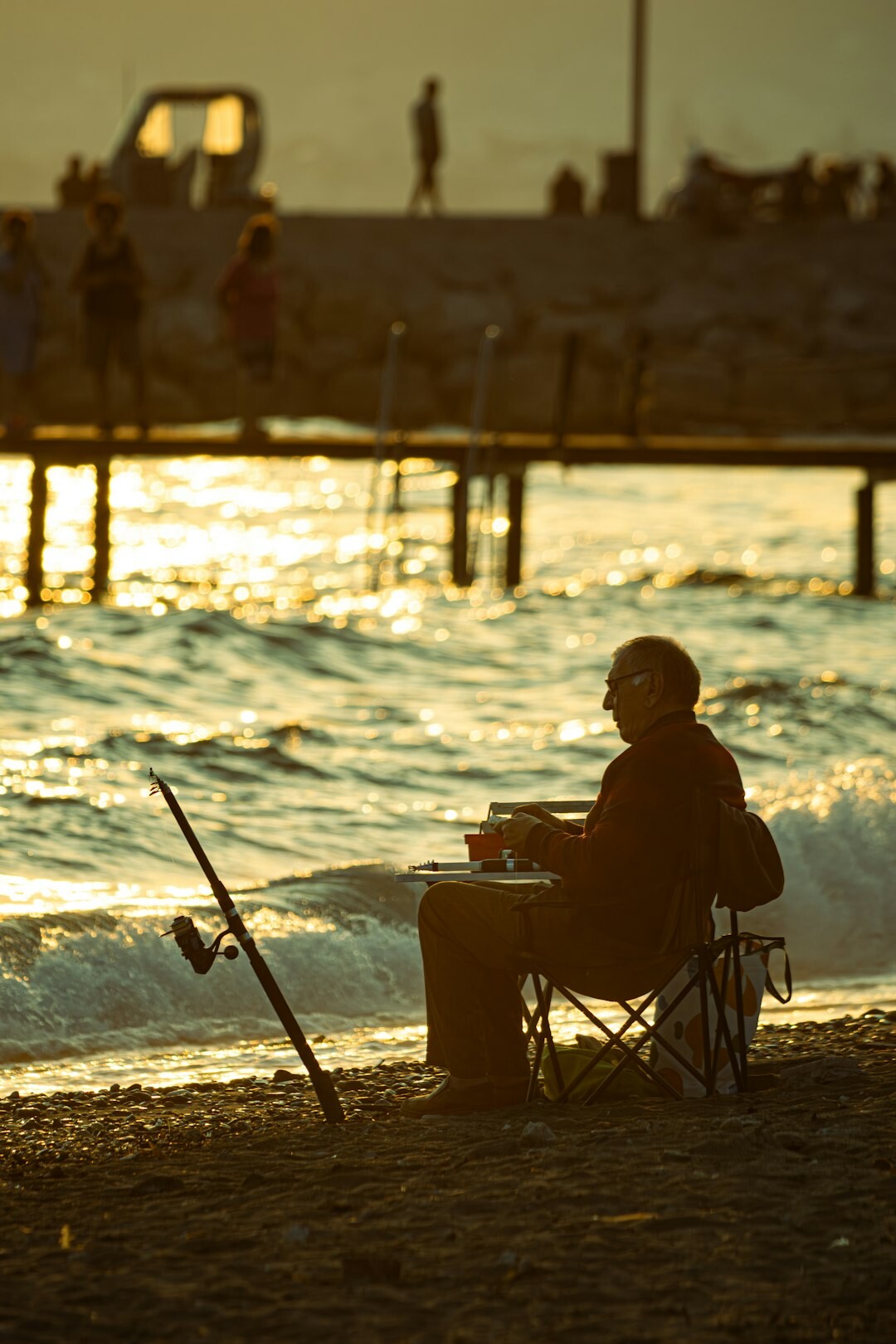 elderly fisherman at table